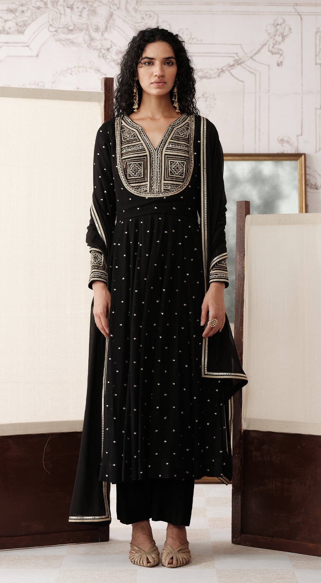 Black viscose georgette Anarkali with mirror and gota work - Basanti kapde aur koffee