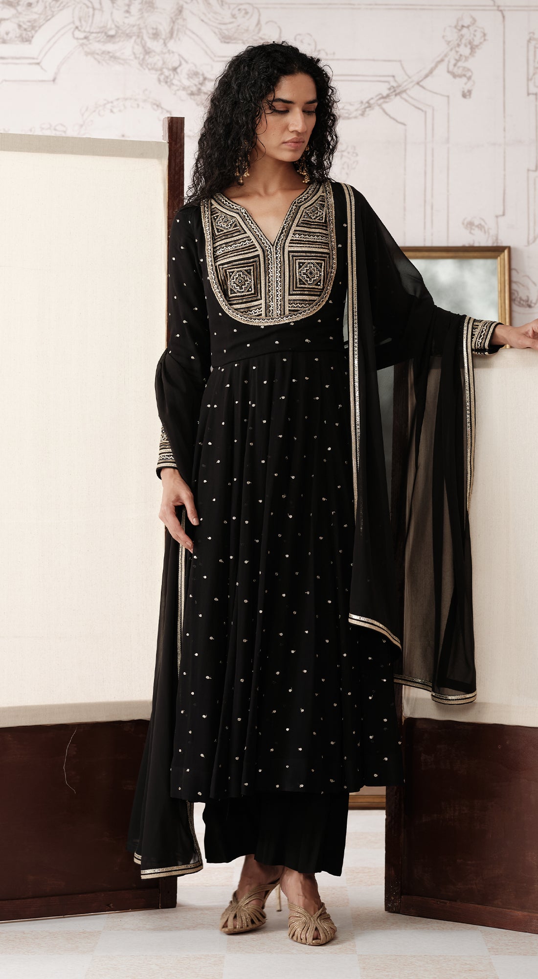 Black viscose georgette Anarkali with mirror and gota work - Basanti kapde aur koffee