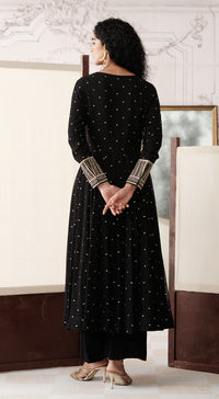 Black viscose georgette Anarkali with mirror and gota work - Basanti kapde aur koffee