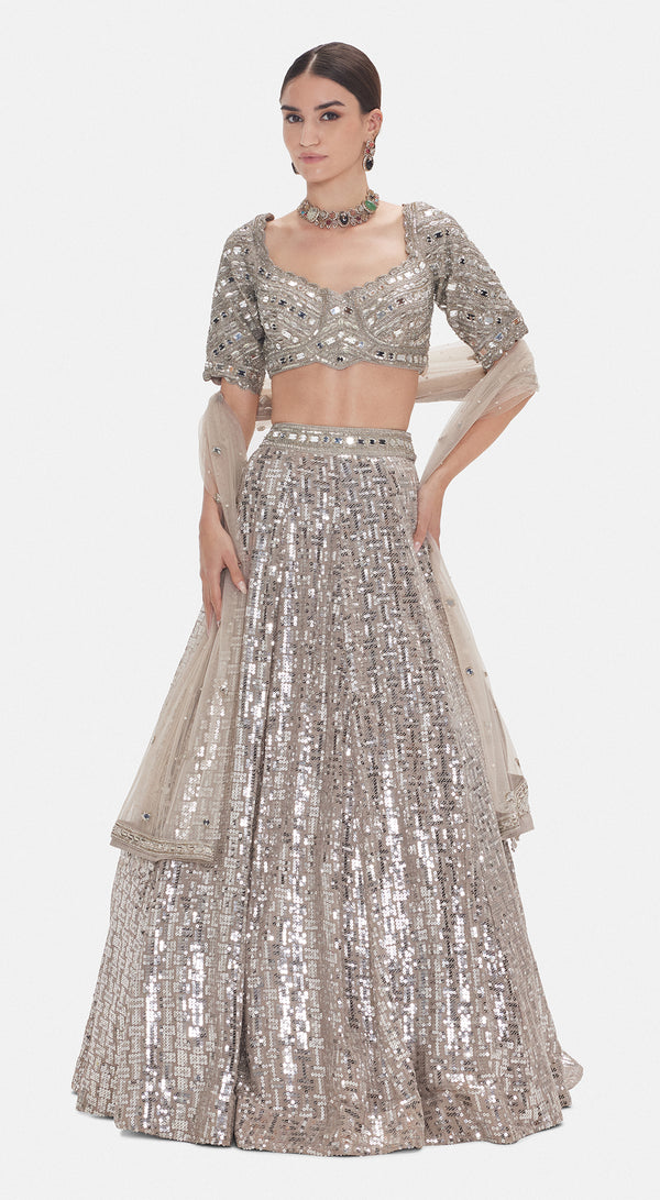Basanti Kapde Aur Koffee The Silver Odyssey grey lehenga with detailed festive embellishments