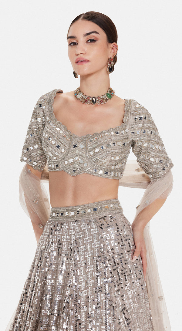 Basanti Kapde Aur Koffee The Silver Odyssey grey lehenga with detailed festive embellishments