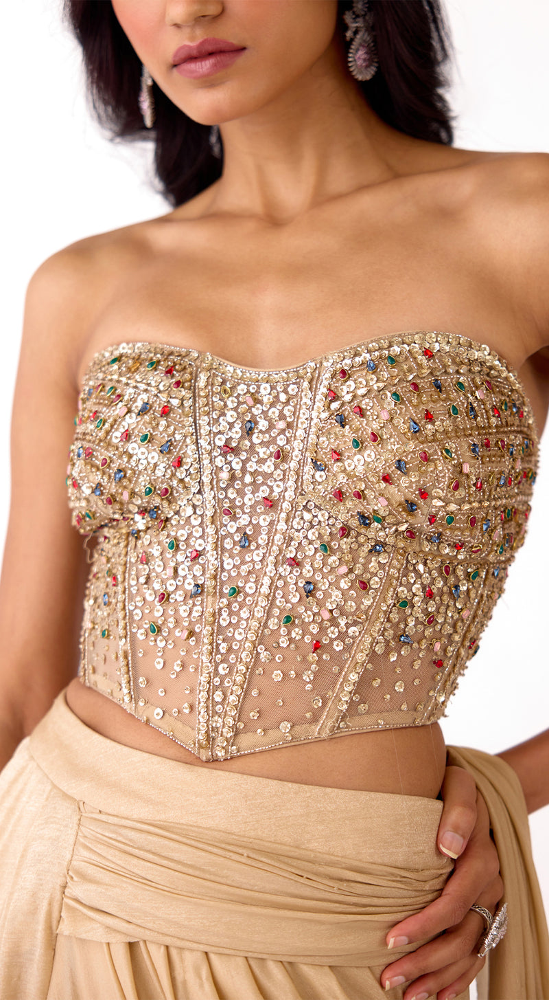 Niki Mehra in Gold Corset Draped Saree