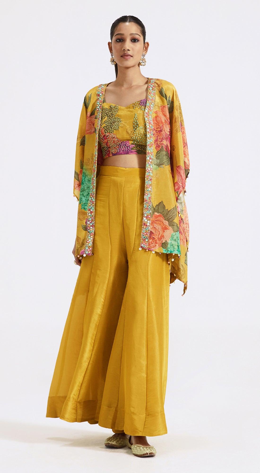 yellow printed crop top with flared pants & cape