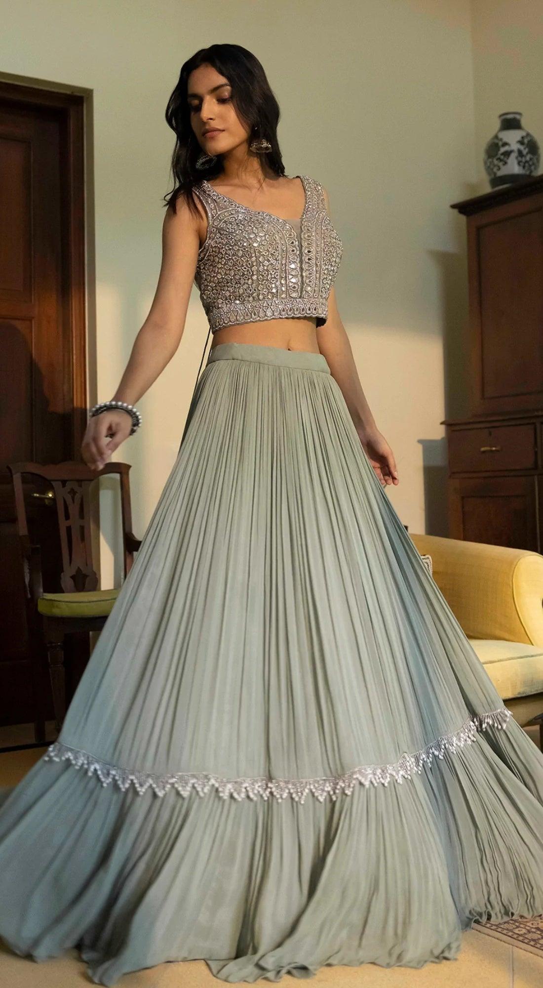 Slate grey pleated lehenga with applique mirror emboidered blouse